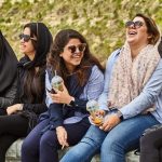 iranian girls are sitting chatting and laughing e1619508567712