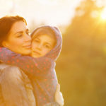 portrait of beautiful mother with love hugging her precious daughter 1