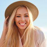 young attractive smiling blond woman e1619437111395